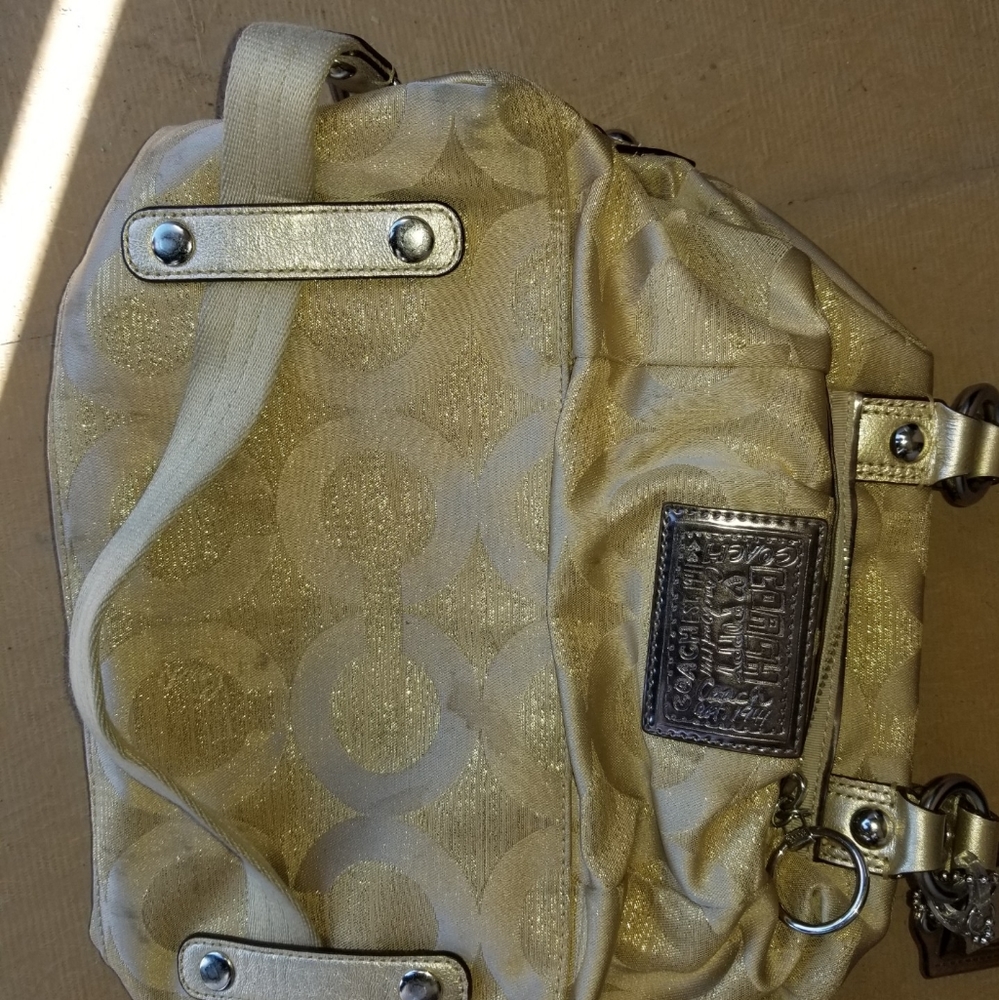 Gold coach purse